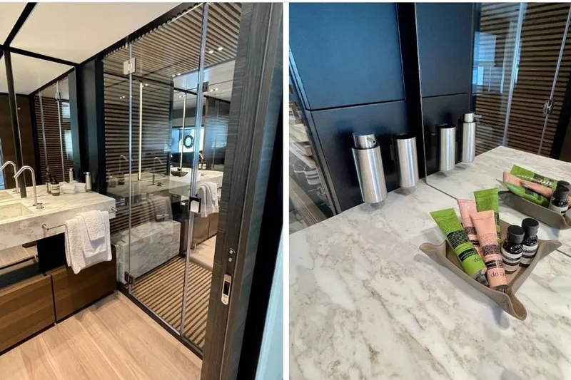 Lumpasaurus Yacht Photos Pics Luxurious bathroom on Custom Line Navetta 33 yacht, featuring marble countertops and elegant amenities.