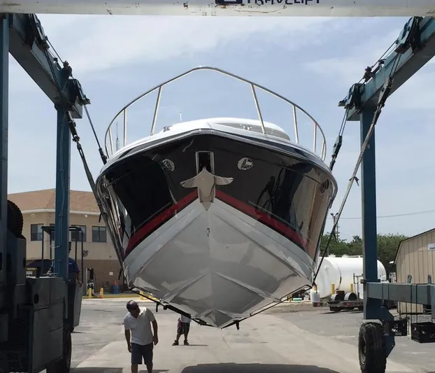  Yacht Photos Pics 2015 Formula 400 FX8 boat being lifted at a marina.