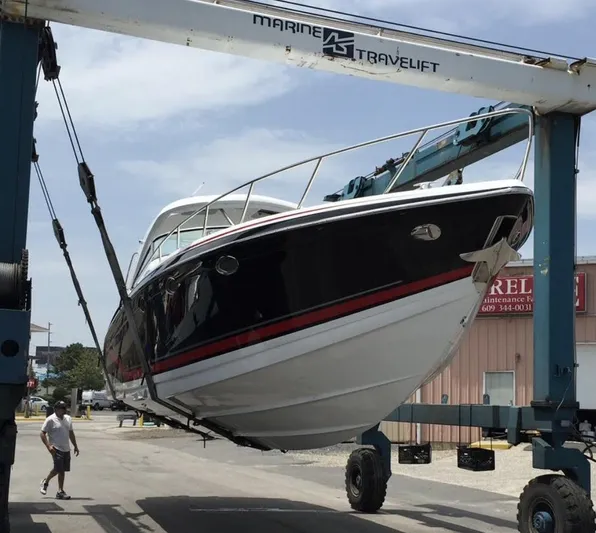  Yacht Photos Pics 2015 Formula 400 FX8 boat being lifted by Marine Travelift.