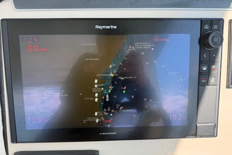  Yacht Photos Pics Raymarine navigation display on 2022 Boston Whaler 320 Vantage, showing nautical map and speed.
