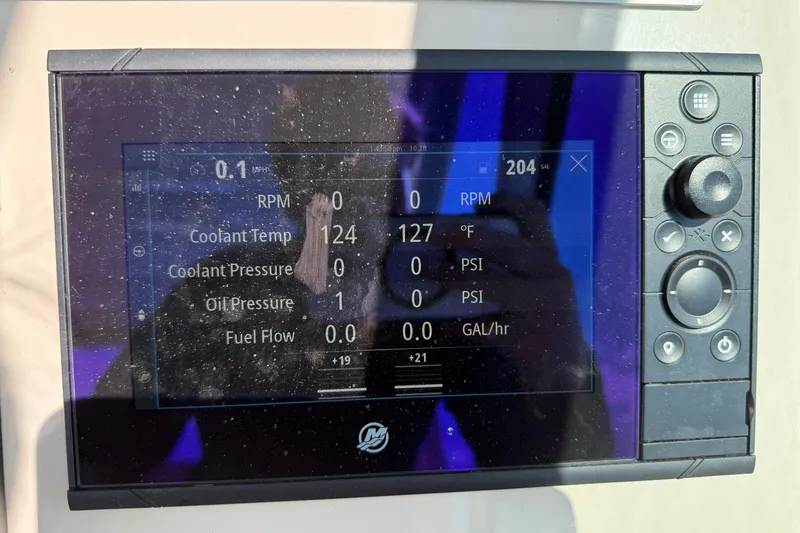  Yacht Photos Pics 2022 Boston Whaler 320 Vantage dashboard display showing engine metrics and controls.