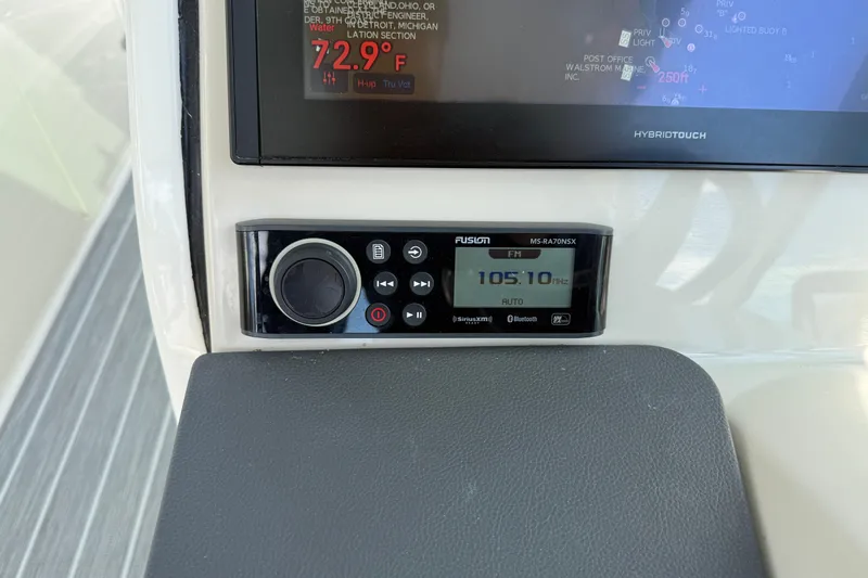  Yacht Photos Pics Control panel of 2022 Boston Whaler 320 Vantage with Fusion MS-RA70NSX radio display.