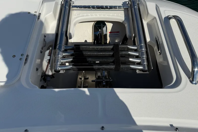  Yacht Photos Pics 2022 Boston Whaler 320 Vantage boat ladder compartment with stainless steel details.
