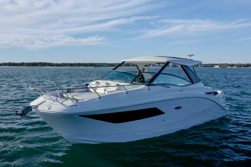  Yacht Photos Pics 2020 Sea Ray Sundancer 320 Outboard cruising on a sunny day.