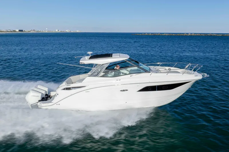  Yacht Photos Pics 2020 Sea Ray Sundancer 320 Outboard cruising on open water.