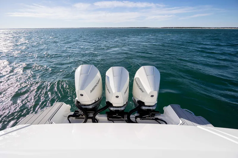  Yacht Photos Pics 2020 Sea Ray Sundancer 320 Outboard with triple Mercury engines on open water.
