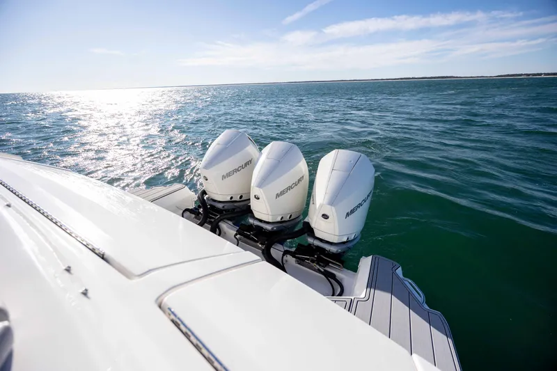  Yacht Photos Pics 2020 Sea Ray Sundancer 320 Outboard with triple Mercury engines on open water.