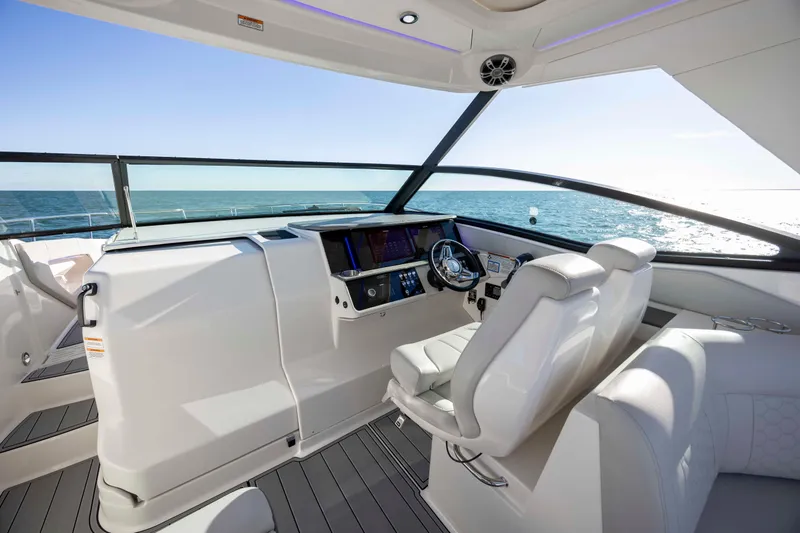  Yacht Photos Pics 2020 Sea Ray Sundancer 320 Outboard helm with modern controls and ocean view.