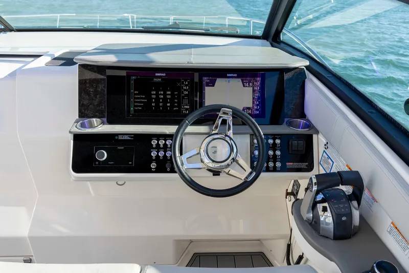 Yacht Photos Pics 2020 Sea Ray Sundancer 320 Outboard helm with modern controls and navigation display.