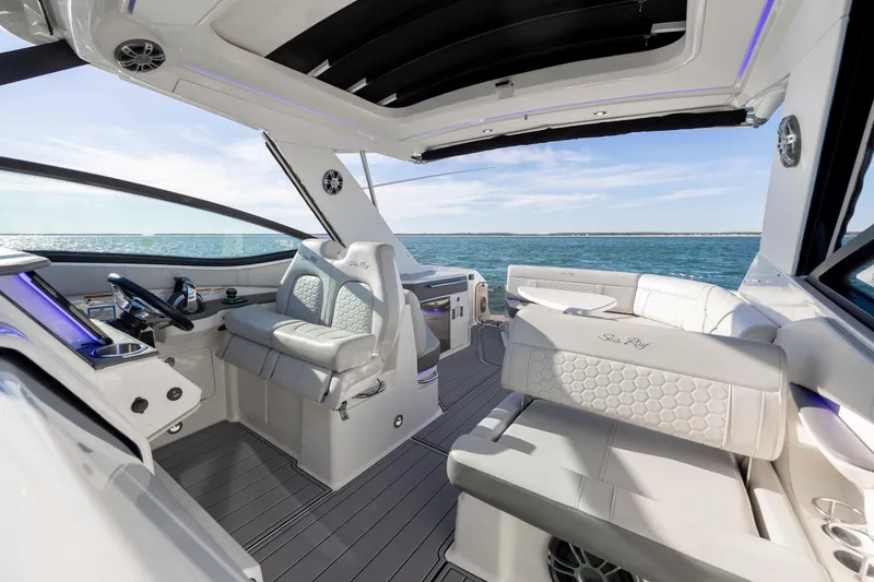  Yacht Photos Pics 2020 Sea Ray Sundancer 320 Outboard interior with luxurious seating and ocean view.