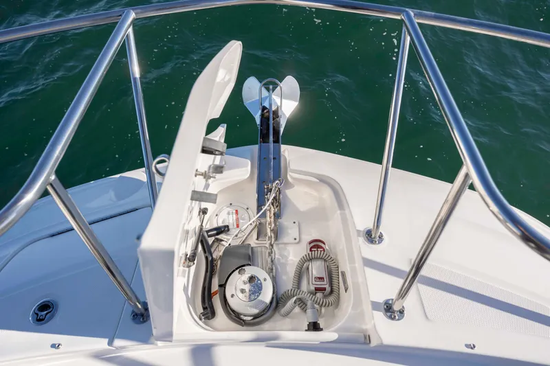  Yacht Photos Pics 2020 Sea Ray Sundancer 320 Outboard anchor system on deck, surrounded by stainless steel railings.