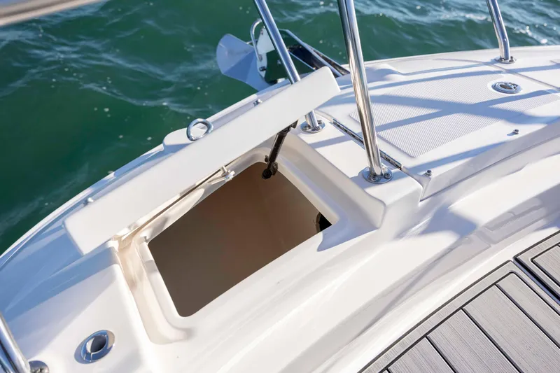 Yacht Photos Pics 2020 Sea Ray Sundancer 320 Outboard boat storage compartment open on deck.