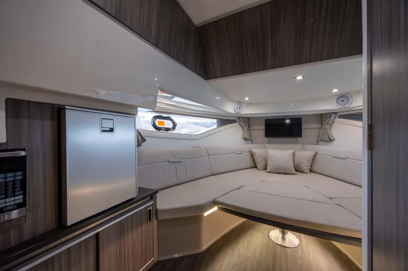  Yacht Photos Pics Interior of 2020 Sea Ray Sundancer 320 Outboard, featuring cozy seating and modern amenities.