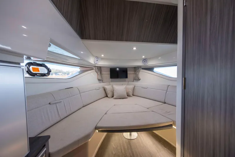  Yacht Photos Pics 2020 Sea Ray Sundancer 320 Outboard interior with cozy seating and modern design.