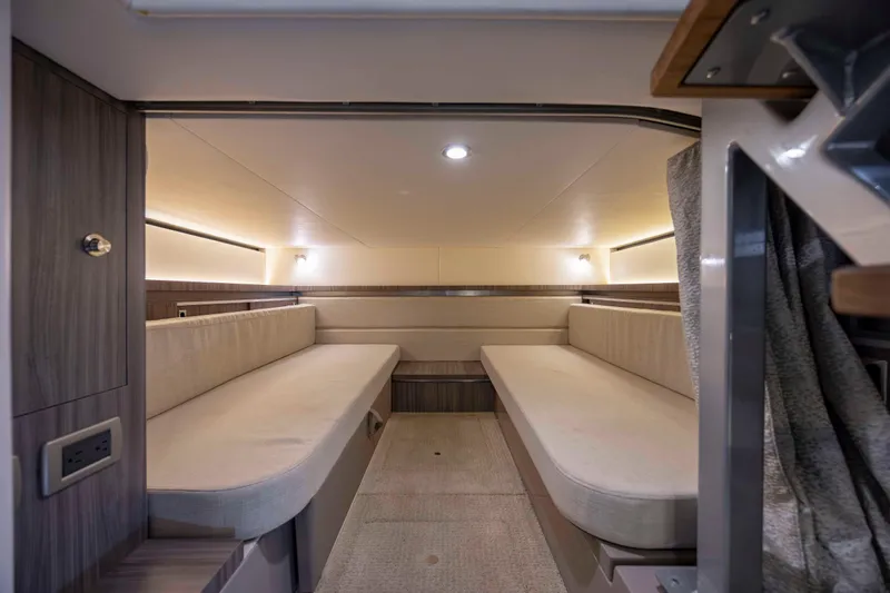  Yacht Photos Pics 2020 Sea Ray Sundancer 320 Outboard cabin interior with twin seating and modern lighting.