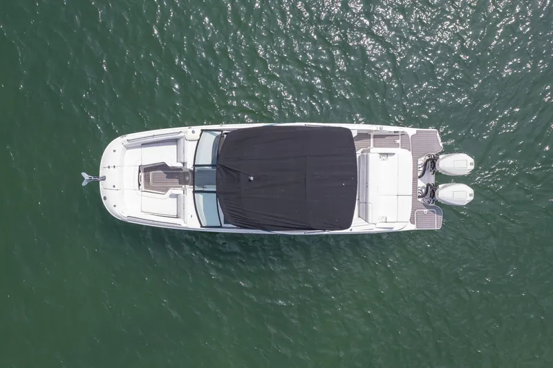 Yacht Photos Pics Top view of 2022 Sea Ray SDX 290 Outboard boat on water.