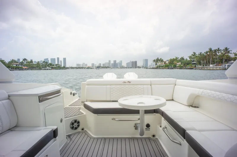 Yacht Photos Pics 2022 Sea Ray SDX 290 Outboard boat interior with city skyline view.