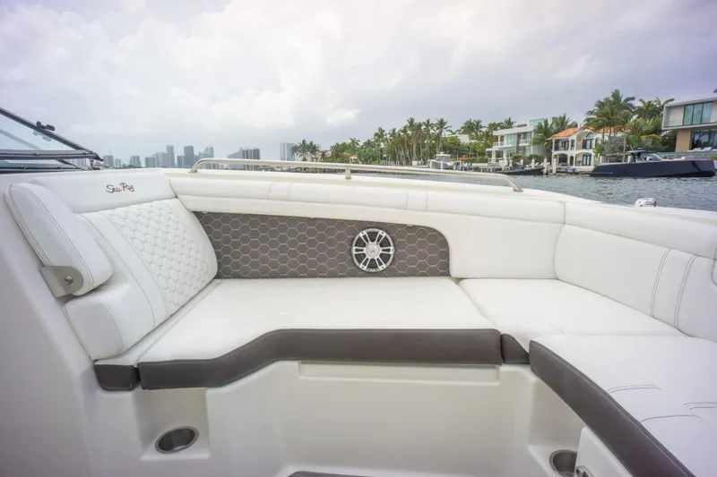  Yacht Photos Pics 2022 Sea Ray SDX 290 Outboard boat interior with luxurious seating and waterfront view.