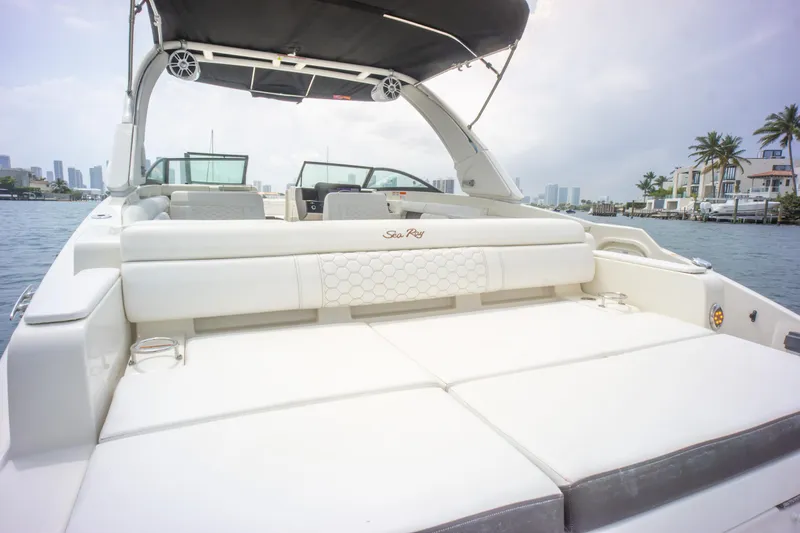  Yacht Photos Pics 2022 Sea Ray SDX 290 Outboard boat with spacious seating and sleek design on the water.