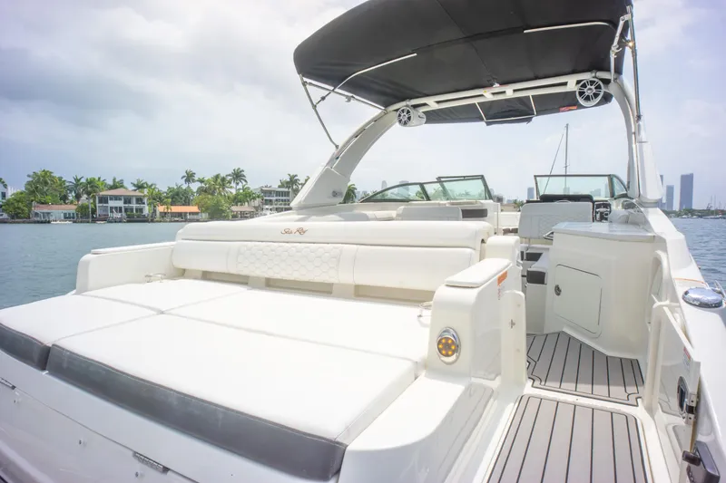  Yacht Photos Pics 2022 Sea Ray SDX 290 Outboard boat with spacious seating and sleek design on the water.