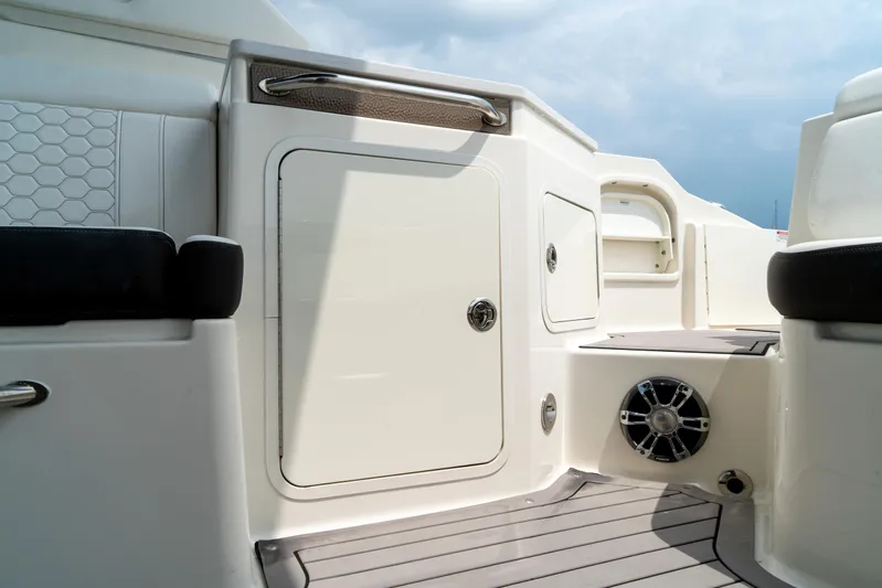  Yacht Photos Pics 2022 Sea Ray SDX 290 Outboard interior with storage and speaker.