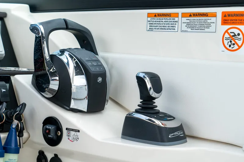  Yacht Photos Pics Control panel of 2022 Sea Ray SDX 290 Outboard boat with joystick and throttle.