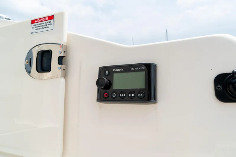 Yacht Photos Pics Control panel on 2022 Sea Ray SDX 290 Outboard boat, featuring Fusion MS-RA70N stereo system.