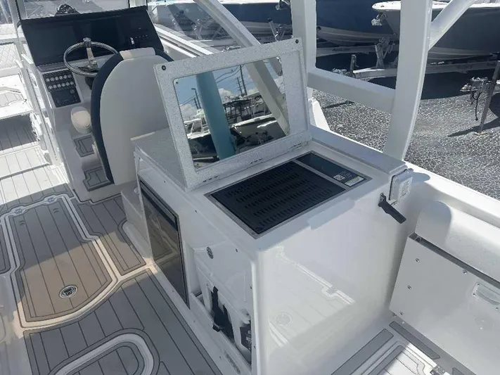 Black Label Marine Yacht Photos Pics 2026 Sea Fox 288 Traveler boat interior with helm and seating area.
