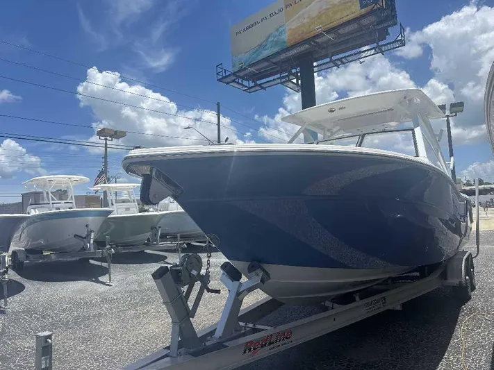 Black Label Marine Yacht Photos Pics 2026 Sea Fox 288 Traveler boat on trailer under a clear blue sky.