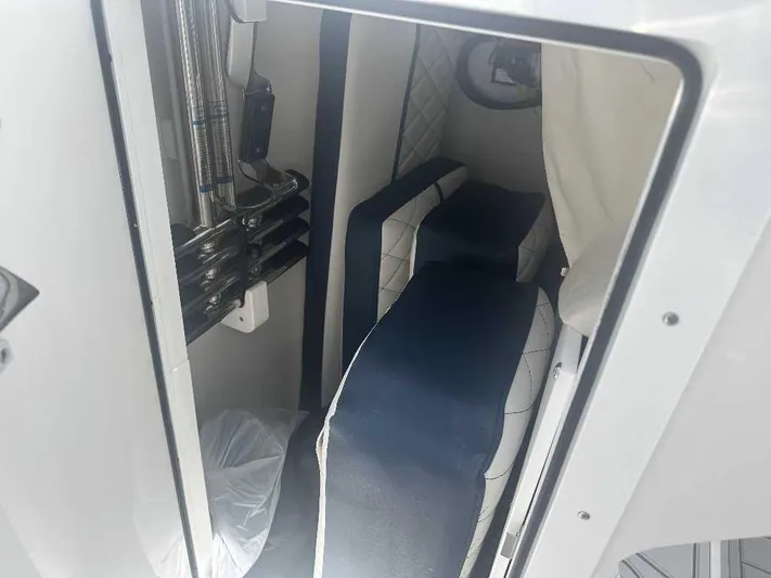 Black Label Marine Yacht Photos Pics Interior cabin of 2026 Sea Fox 288 Traveler boat with seating and storage.