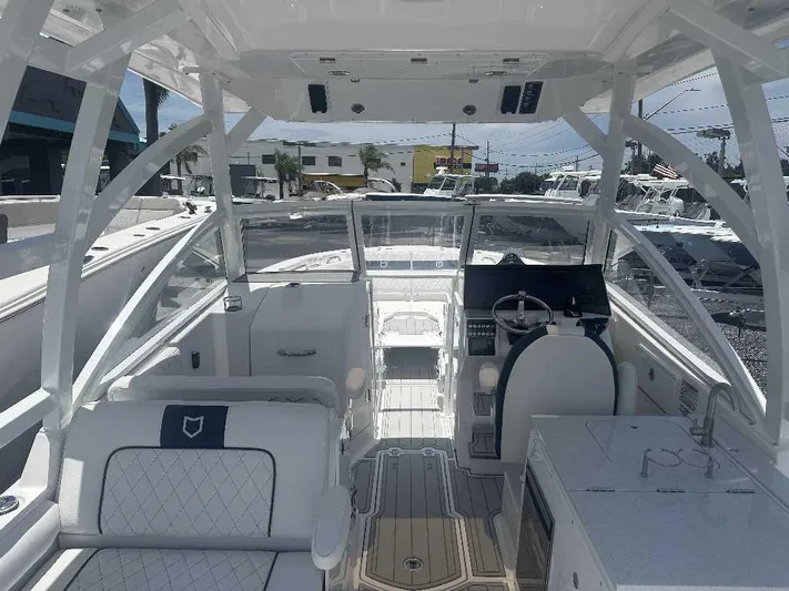 Black Label Marine Yacht Photos Pics 2026 Sea Fox 288 Traveler boat interior with helm, seating, and modern amenities.
