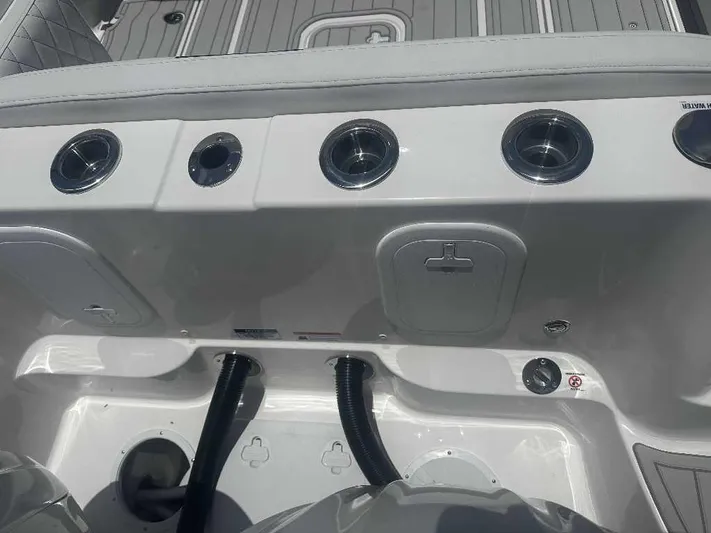 Black Label Marine Yacht Photos Pics 2026 Sea Fox 288 Traveler boat interior with cup holders and storage compartments.