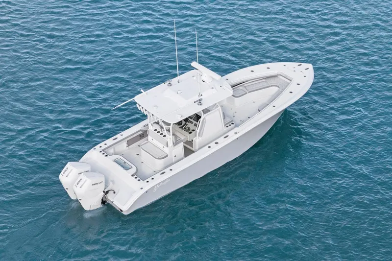  Yacht Photos Pics 2026 Yellowfin 32 Offshore boat on clear blue water.