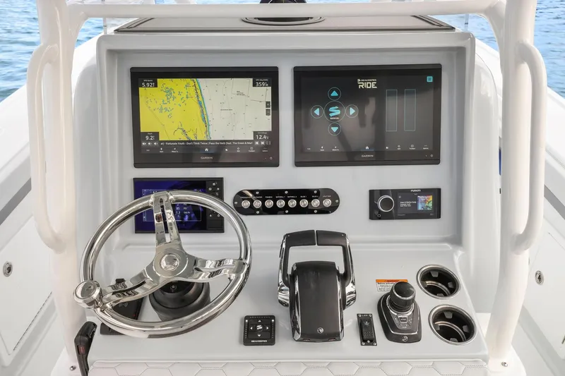  Yacht Photos Pics 2026 Yellowfin 32 Offshore boat dashboard with advanced navigation and control systems.