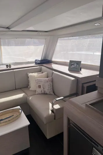 Scarlet Ibis Yacht Photos Pics 2023 Fountaine Pajot Isla 40 interior with modern seating and decor.