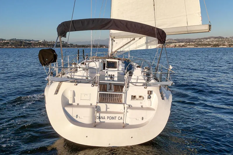 Firelight Yacht Photos Pics Sailing yacht Catalina 470, 1999 model, cruising on calm waters near Dana Point, CA.