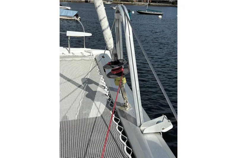 Littlest Hobo Yacht Photos Pics 2009 Fountaine Pajot Orana 44 Maestro catamaran deck with rigging and netting.