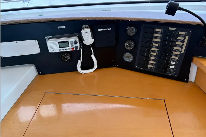 Littlest Hobo Yacht Photos Pics Control panel of 2009 Fountaine Pajot Orana 44 Maestro, featuring navigation and communication equipment.