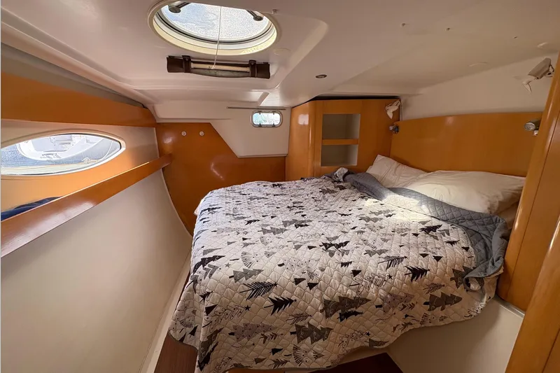 Littlest Hobo Yacht Photos Pics Cozy cabin interior of 2009 Fountaine Pajot Orana 44 Maestro catamaran.