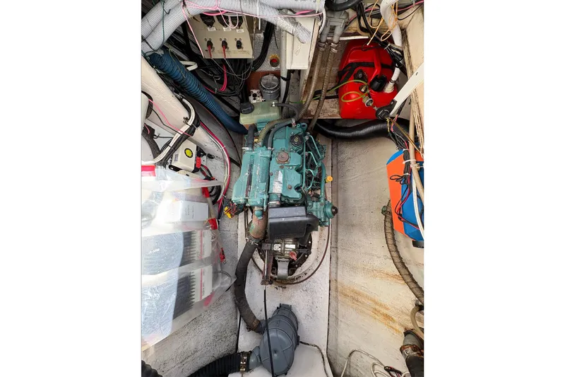 Littlest Hobo Yacht Photos Pics Engine room of 2009 Fountaine Pajot Orana 44 Maestro catamaran, showcasing mechanical components.