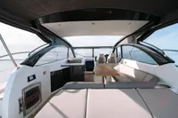 2016 Princess V48 Open yacht interior with seating and table.