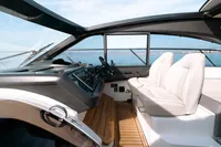 2016 Princess V48 Open yacht interior with sleek dashboard and comfortable seating.
