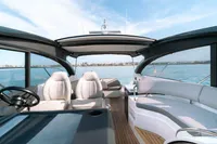 2016 Princess V48 Open yacht interior with luxurious seating and ocean view.
