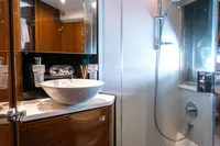 Luxurious bathroom in 2016 Princess V48 Open yacht with modern fixtures and elegant design.