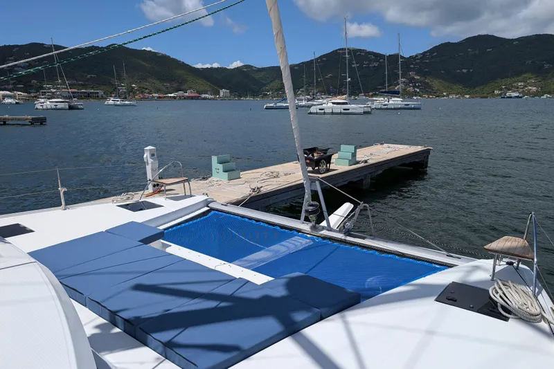 Love A Fayre Yacht Photos Pics Fountaine Pajot Astrea 42 catamaran docked in scenic marina, 2020 model.