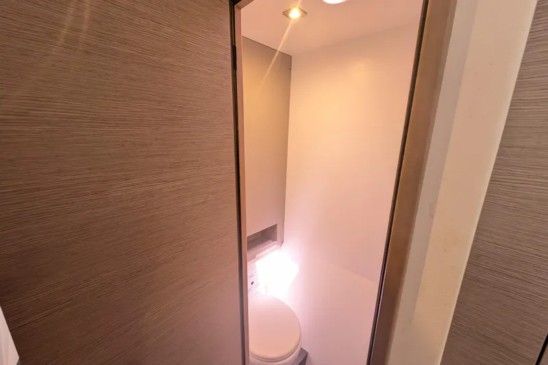 Love A Fayre Yacht Photos Pics Bathroom interior of 2020 Fountaine Pajot Astrea 42 catamaran, featuring modern design and lighting.