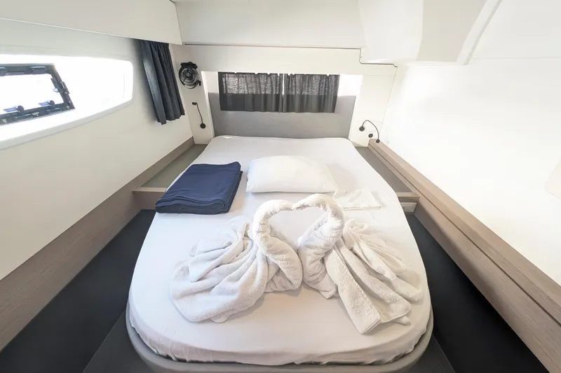 Love A Fayre Yacht Photos Pics Luxurious cabin interior of 2020 Fountaine Pajot Astrea 42 with elegant bedding.