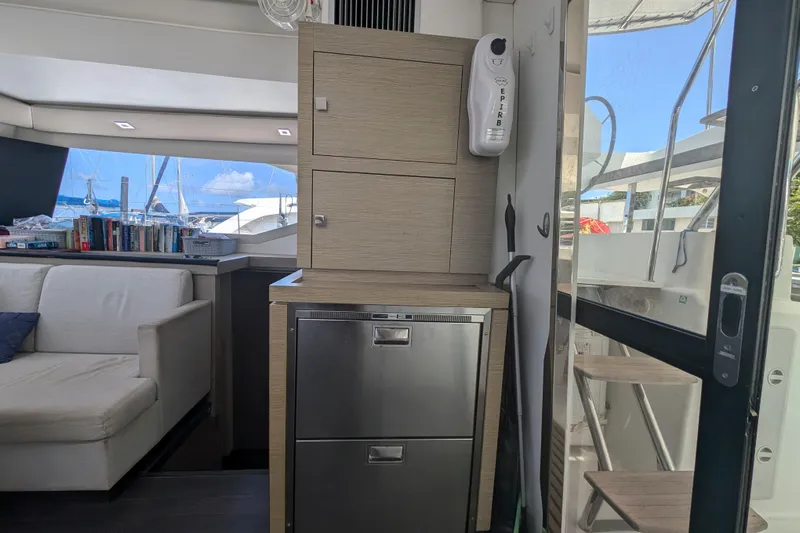 Love A Fayre Yacht Photos Pics Interior of 2020 Fountaine Pajot Astrea 42 yacht with modern cabinetry and seating.