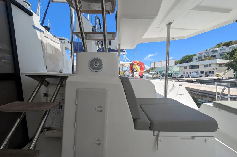 Love A Fayre Yacht Photos Pics 2020 Fountaine Pajot Astrea 42 yacht deck with seating and marina view.
