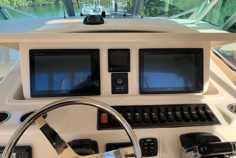  Yacht Photos Pics Helm of 2015 Grady-White Express 370 with dual Garmin displays and controls.